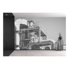 a large wall mural in an industrial setting