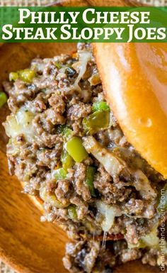 a close up of a plate of food with meat and vegetables on it, text overlay reads phily cheese steak sloppy joes