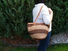 leather sisal bag, sisal tote bag, sisal shoulder bag, market bag, beach tote bag, boho shoulder bag, large beach bag, large size, straw leather bag, sisal beach bag, jute shopper, boho sisal bag, boho beach bag, --------------------------- Sisal Bag with leather straps.  Thick heavy-duty weave makes a very durable bag that will last for a many years. Perfect for the beach or shopping.  More details: *Sisal and leather with zipper and lining *Real leather shoulder straps *16 ½ "W x 8"W x 12"H (4 Handwoven Leather Tote Beach Bag, Leather Basket Beach Bag For Everyday, Handwoven Leather Beach Bag In Natural Color, Natural Leather Handwoven Beach Bag, Large Capacity Leather Tote Straw Bag, Natural Tote Satchel For Shopping, Beach Tote Bag With Leather Handles, Handwoven Tote Bucket Bag, Handwoven Leather Tote Crochet Bag