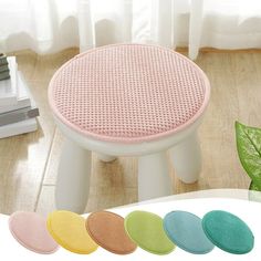 the foot stool has five different colors on it