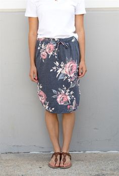 Hey there fashionista! Get ready to add a new favorite to your wardrobe with our Floral Weekend Skirt! We believe you can never have too many florals, and this skirt is no exception. Made with super soft and comfy lightweight fabric, it's perfect for any weekend adventure. The elastic waist ensures a comfortable fit, while the knee-length design adds a touch of sophistication. Dress it down with a white tee and Converse for a casual look, or dress it up with a cardigan and wedges for a night out Floral Print Pencil Skirt For Day Out, Casual Floral Print Pencil Skirt, Casual Pencil Skirt With Floral Print, Casual Floral Print Skirt For Day Out, Casual Floral Print Midi Skirt, Casual Midi Skirt With Floral Print, Comfy Skirt, Hooded Sweatshirt Dress, Modesty Fashion