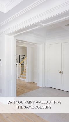 an empty living room with white walls and trim on the same color as wood floors