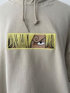 -Double fabric hood -Self-coloured flat draw cord -Single jersey back neck tape -Waist and cuff in cotton/elastane rib Embroidered Anime Hoodie Crewneck, Unisex Anime Hoodie Crewneck, Unisex Manga Hoodie Crewneck, Anime Sweater, Anime Sweatshirt, Anime Shirt, Anime Fan Gift DETAILS: Anime Unisex Embroidered Sweatshirt 50% cotton 50% polyester SIZE: Hoodies are true to size. For detailed sizing information, please check out the sizing chart under the photos to find the right size for you! All swe Cotton Hooded Sweatshirt With Embroidered Graphics, Embroidered Patch Cotton Sweatshirt For Streetwear, Cotton Hoodie With Embroidered Graphics For Streetwear, Embroidered Cotton Sweatshirt For Streetwear, Cotton Hoodie With Embroidered Patch For Streetwear, White Hooded Hoodie With Embroidered Patch, Beige Cotton Sweatshirt With Embroidered Logo, Anime Style Cotton Hoodie Sweatshirt, Beige Hooded Cotton Sweatshirt