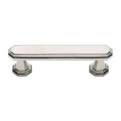 a chrome cabinet handle on a white background