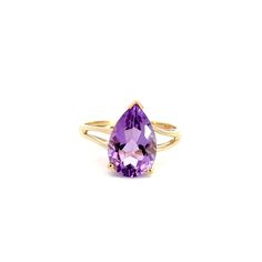 A solitaire ring.  Prong set in the center of the ring is a pear shaped faceted amethyst. The ring has a split style shank. This ring is a size 11.  This ring includes a free sizing up or down 2 sizes.  Once a ring is re-sized, we guarantee the work but we are unable to offer a full refund on the ring. Please contact us for additional sizing options and updated shipping dates if you would like the ring to be sized.   Stone Information Type: Amethyst Measurements: 15.2x10.0mm Metal Content Guaran Classic Teardrop Gemstone Rings, Formal Pear-shaped Amethyst Ring With Prong Setting, Formal Teardrop Amethyst Ring In Fine Jewelry Style, Teardrop Amethyst Ring For Formal Occasions, Elegant Teardrop Amethyst Ring For Formal Occasions, Formal Amethyst Pear-shaped Ring, Elegant Teardrop Amethyst Gemstone Ring, Pear-shaped Purple Amethyst Ring With Prong Setting, Purple Pear-shaped Amethyst Ring With Prong Setting