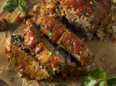 meatloaf with marinara sauce and parsley on top