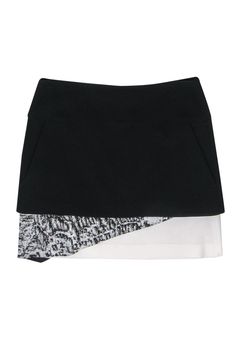 Current Boutique-Helmut Lang - Black & White Layered Miniskirt Sz 2 Fitted Tiered Skirt For Layering, Chic Mini Skirt With Layered Hem, Chic Layered Fitted Bottoms, Chic Fitted Layered Bottoms, Cotton Mini Skort For Night Out, Fitted Asymmetrical Skirt For Layering, Fitted Black Skirt With Layered Hem, Chic Fitted Skirt With Layered Hem, Chic Cotton Asymmetrical Mini Skirt