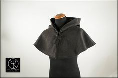 Made to order 100% woolen hooded cape comes in your choice of wool colors . It's a full circle with a lovely clousure with eyelets and lace (available also with clasps or button clousure). Cotton or satin lining available. Custome made. Unisex. Differt colours avalaible. 2 - 4 weeks for the shipping, it depends on the colors availability. The standard shipment for this item is posta priority, UPS expedited shipment available on request. Remember to read our policies before buying Fitted Cape For Winter Costumes, Fitted Cape For Costume, Winter Season, Fitted Cape For Costume And Winter, Fitted Cape For Costume Occasions In Winter, Fitted Winter Cape For Cosplay, Gothic Hooded Winter Cape, Medieval Winter Outerwear For Fantasy Events, Medieval Outerwear For Fantasy Events In Winter, Elven Style Cape For Costume In Winter