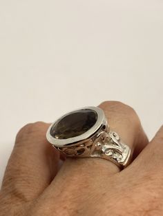 Vintage Smoky Topaz Ring 925 Sterling Silver Unusual Deep Toned Smoky Topaz 925 Sterling Filigree Setting Handmade Size 7.5 can be resized, my jeweler charges $10-$20 All rings are shipped free in the US in a nice gift box. Check out our over a THOUSAND great reviews Engraving is $4 per letter and is not always perfect depending on the piece. It can take a few days if the jeweler is busy. This is payable to Paypal Judithsltd@gmail.com Antique Sterling Silver Ring With Large Stone, Formal Sterling Silver Crystal Ring With Round Stone, Faceted Silver Ring Fine Jewelry, Formal Sterling Silver Crystal Ring With Gemstone, Formal Sterling Silver Crystal Ring With Round Cut, Fine Jewelry Faceted Silver Ring, Formal Sterling Silver Topaz Ring With Polished Finish, Silver Faceted Fine Jewelry Ring, Classic Large Stone Jewelry For Anniversary