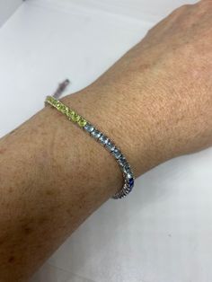 Vintage Cubic Zirconia Bracelet Clear rainbow Crystal Tennis 7.5 inches All jewelry is shipped free in the US in a nice gift box. Check out our over a THOUSAND great reviews Engraving is $4 per letter and is not always perfect depending on the piece. It can take a few days if the jeweler is busy. This is payable to Paypal Judithsltd@gmail.com Multicolor Cubic Zirconia Tennis Bracelet Gift, Sterling Silver Tennis Bracelet With Sparkling Stones As Gift, Elegant Multicolor Tennis Bracelet As A Gift, Luxury Multicolor Tennis Bracelet As Gift, Multicolor Cubic Zirconia Tennis Bracelet For Anniversary, Elegant Multicolor Diamond Bracelet As Gift, Multicolor Bracelets With Sparkling Stones For Gift, Adjustable Multicolor Tennis Bracelet Gift, Adjustable Multicolor Tennis Bracelet As Gift