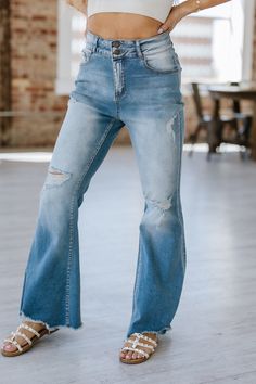 Experience the perfect combination of comfort and style with our Ayah Light Wash Flare Jeans. Made from high-quality denim, these jeans provide a flattering, slimming fit while the flare design adds a touch of trendy flair. Elevate your wardrobe and make a statement with these must-have jeans! Material:75% Cotton + 23% Polyester + 2% Elastane Model info; Models are 5'7", Size 2, wearing smalls Denim Flare Jeans With Frayed Hem In Medium Wash, Medium Wash Denim Flare Jeans With Frayed Hem, Medium Wash Denim Flares For Fall, Fitted Denim Flares With Frayed Hem, Casual Medium Wash Flares For Fall, Trendy Mid-rise Medium Wash Flares, Spring Denim Blue Flares With Frayed Hem, Fall Flare Jeans With Frayed Hem In Denim Blue, Fall Denim Blue Flare Jeans With Frayed Hem