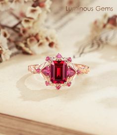 𝐌𝐚𝐢𝐧 𝐒𝐭𝐨𝐧𝐞 𝐒𝐩𝐞𝐜: 💎 Stone: Ruby (Lab) 💎 Carat: 1.0ct 💎 Dimension: 5mm*7mm 💎 Cut: Princess cut 𝐒𝐢𝐝𝐞 𝐒𝐭𝐨𝐧𝐞𝐬 𝐒𝐩𝐞𝐜: 💎 Stone: Ruby (Lab) 💎 Carat: 0.20ct 🎨 Materials Available: ＊ 925 Sterling Silver ＊ 925 Sterling Silver (Electroplated) ＊ 10K Gold ＊ 14K Gold ＊ 18K Gold ＊ Platinum 📝 Reach out to me directly to personalize your ring size or gemstone--customization services are available upon request 📦 Packaging: Each ring is meticulously set in an elegantly designed gi Square Cut Ruby Ring For Wedding, Square Cut Ruby Wedding Ring, Elegant Red Princess Cut Ruby Ring, Anniversary Ruby Ring Princess Cut Red, Red Princess Cut Ruby Ring With Prong Setting, Rectangular Red Ruby Ring For Wedding, Rectangular Ruby Ring For Wedding, Anniversary Red Ruby Princess Cut Ring, Princess Cut Ruby Promise Ring