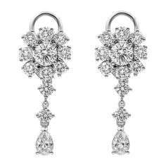 Each elegant and brilliant dangle earring showcases two GIA certified round brilliant diamond weighing 1.54 carats total, D-E color and SI1 in clarity, surrounded by brilliant round melee diamonds set in a halo. Brilliant Round and pear shape diamonds are elegantly drop from the diamond halo weighing 5.96 carats total, E-F color and VS in clarity respectively. Perfectly made in platinum. Roman Malakov is a custom house, specializing in creating anything you can imagine. If you would like to rece Glamour Nails, Pear Cut Diamond, Pear Shaped Diamond, Antique Earrings, Fantasy Jewelry, Brilliant Diamond, Diamond Cluster, Gia Certified Diamonds, Pear Cut