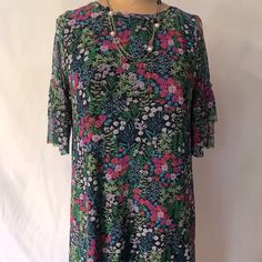 Nwot Floral Print Round Neck Tunic Dress , Features 3/4 Bell Sleeves, Knee Length. Fully Lined. Approx Measures: Shoulders: 14" Armpit To Armpit : 18" Length : 35" Sleeve Lenght : 13" Fabric Composition : 95% Polyester - 5% Elastane Green Floral Print Shift Mini Dress, Stretch A-line Dress With Floral Print, A-line Dress With Floral Print And Stretch Fit, Floral Print Dress, Tunic Dress, Bell Sleeves, Knee Length, Casual Dresses, Round Neck