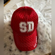 San Diego Red And White Snap Back Hat One Size Fit All Trendy Red Baseball Cap For Sports, Red Letter Print Hat For Baseball Season, Casual University Red Baseball Cap, Casual Red Trucker Hat With Letter Print, Trendy Red Dad Hat, Trendy Red Dad Hat One Size, Casual Red Baseball Hats, Red Baseball Cap One Size Fits Most, Trendy Red Dad Hat One Size Fits Most