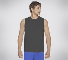 Stay dry and comfortable in bicep-friendly style wearing Skechers GO DRI Charge Muscle Tank. This sleeveless muscle tank features our soft moisture-wicking and quick-drying GO DRI fabric. | Skechers Men's GO DRI Charge Muscle Tank Top | GO DRI ALL DAY fabric is a lightweight performance jersey that has active stretch, quick dry technology and breathability to keep you cool and comfortable all day long | Sleeveless crewneck silhouette | Active Fit | 100% Polyester | Reflective Skechers logo detai Jen Stark, Cold Weather Hats, Muscle Tank Top, Lace Up Wedges, Muscle Tank Tops, Waterproof Shoes, Skechers Women, Muscle Tank, Muscle Tanks