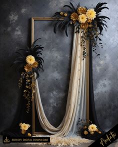 an ornate photo frame decorated with flowers and black feathers is featured in this artistic photograph