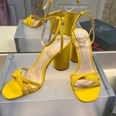 This Beautiful Fun Filled Yellow Sandal Is Offered New. It Is A Fun Summer Must Have And Is Your Wear With Everything Shoe! Yellow Heels With Ankle Strap And Heel Strap, Yellow Heels With Ankle Strap, Yellow Sandals With 4-inch Heel For Summer, Yellow Sandals With Wrapped Heel And Ankle Strap, Yellow Ankle Strap Sandals With Wrapped Heel, Yellow Synthetic Sandals For Evening, Yellow Ankle Strap Heels With Heel Loop, Trendy Yellow Sandals For Evening, Yellow Heels With Ankle Strap And Heel Loop