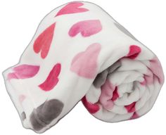 a white blanket with pink and grey hearts on it