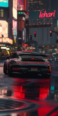 a car is parked on the street in front of neon signs and buildings at night