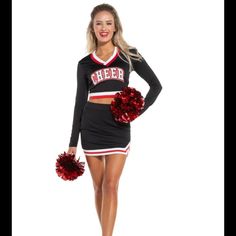 a woman in a cheerleader outfit posing for the camera with her pom poms