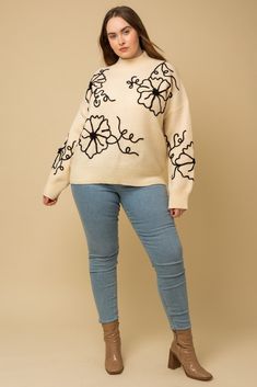 Mock neck sweaters were once solely the domain of ski slopes and winter cabins, but not anymore. This Feel Good Stuff mock neck sweater brings the cozy-chic style into the everyday. With its contrasting floral embroidery dancing across the body and sleeves, this topper is equal parts stylish and snuggly. The mock neckline provides extra coverage without the bulk of a traditional turtleneck, so you can stay warm without overheating. Whether you're pairing it with jeans for a casual coffee date or Winter Cabins, Rachel Clark, Winter Cabin, Ski Slopes, Cozy Chic, Mock Neckline, Mock Neck Sweater, Floral Embroidery, Stay Warm