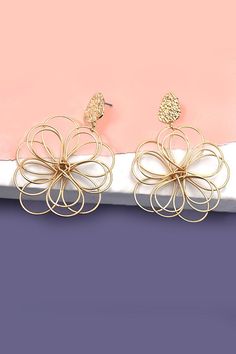 A fusion of floral beauty and modern design that will elevate your style and add a touch of sophistication to any outfit. These exquisite earrings feature intricately crafted matte flowers that are delicately entwined, creating a unique and elegant accessory.Product Details:length: 2.5" width: 1.75" earring back: Postmetal finish: gold, rhodium Platingproduct: Lead & Nickel Compliantanti-tarnish: Double E-coating Filigree Flower Earrings, Elegant Metal Flower Earrings, Elegant Metal Flower Charm Earrings, Flower Dangle Earrings, Post Metal, Rounded Rectangle, Sunglass Chain, Wall Accessories, Elegant Accessories