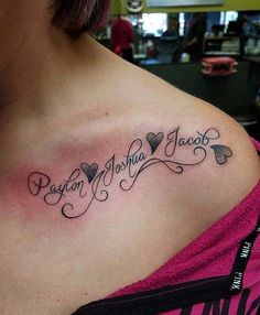 a woman with a tattoo on her chest that says, i love you in cursive writing