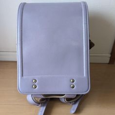 Randoseru : This randoseru made by Tsuchiya Bag company Which is one of the best randoseru maker in Japan. Its made by high quality Cowhide.  Item: Cowhide Leather school Bag / Japanese Randoseru - Lavender & White No.rnd013 Condition: Used/ Good. Please check the listing pictures. Size: Adult Wearable You could put your laptop without any ploblem. Tsuchiya Bag Company / Made in Japan Tsuchiya bag is one of the best randoseru maker in Japan. https://fujiyamarock.etsy.com Shipping Japan Post take Portable Leather Backpack For Everyday Use, Portable Backpack For Trips, Portable Standard Backpack For Trips, Rectangular School Satchel, Portable Gray Backpack For School, Gray Backpack Shoulder Bag For School, Rectangular Student Backpack, Back To School Softback Leather Backpack, Portable Leather Backpack For Daily Use