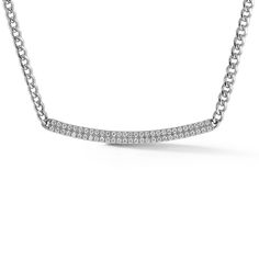 The Sylvie Rose Cuban Chain Long Bar Necklace is for lovers of all things extra. We’ve taken one of our most coveted bar necklace styles and added even more glam with a solid, 14K gold Cuban chain. The elongated, delicate pave-set diamonds on a slightly curved bar results in an ultra-flattering shape with a sense of movement. The long bar is one of our most coveted styles, as it stuns on its own and also pairs beautifully with the rest of your collection for an enviable necklace stack. Layer this diamond bar necklace with other Dana Rebecca Designs classics for a dripping-in-diamonds look. Available in 14k white, yellow, and rose gold. 14 Karat Gold 0.43 Diamond Carat Weight Bar is 43.5mm in Length Available in both 16" and 18" Chain Length Diamonds are G/H Color and SI Clarity Cuban Chain Gold Cuban Chain, Necklace Styles, Weight Bar, Bar Necklaces, Dana Rebecca Designs, Diamond Bar Necklace, Necklace Stack, Curved Bar, Kids Bracelets