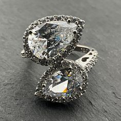 Vintage Cubic Zirconia Sterling Silver Teardrop Wrap Statement Ring, UK Size K, US Size 5 1/4, EU Size 49 1/2, Stamped 925 DQCZ Diamond Quality Cubic Zirconia, Front Max Width 21mm, Weight 6.77 Grams, Lovely Condition Silver Teardrop Ring With Diamond Accents, Teardrop Cubic Zirconia Diamond Ring For Anniversary, Teardrop Cubic Zirconia Diamond Ring With Halo Setting, Dazzling Silver Teardrop Diamond Ring, Teardrop Cubic Zirconia Ring With Diamond Accents, Teardrop Diamond Cut Ring, Teardrop Cubic Zirconia Diamond Ring In Diamond White, Teardrop Cubic Zirconia Diamond White Ring, Dazzling Teardrop Rings With Diamond Accents