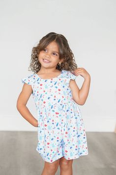 Made for cartwheels and jump rope - this romper was inspired by adventurous girls! Featuring a ruffled detail on the shoulder, mid length shorts with side seam pockets in our signature extra soft and stretchy cotton fabric. Featuring our custom Sweet Freedom all over print by Sunny Spot Studios 95% Cotton 5% Spandex Wash cold with like colors Hang or lay flat to dry for longer wear Playful Printed Bubble Romper For Playtime, Short Sleeve Bubble Romper With Ruffles For Playdate, Short Sleeve Ruffle Bubble Romper For Playdate, Blue Casual Bubble Romper For Playdate, Casual Blue Bubble Romper For Playdate, Cute Printed Jumpsuits And Rompers For Playwear, Casual Cotton Jumpsuits And Rompers With Ruffles, Playful Flutter Sleeve Bubble Romper For Playtime, Playful Short Sleeve Bubble Romper For Playdate