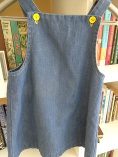 Toddler 1970's Blue Denim Sum Dress/Jumper by Tiny Folks 50 % Polyester 50% Cotton 6 1/4 X 5 Inch Front Pocket with Rabbit & Turtle Appliques 4 Yellow Strap Buttons MEASUREMENTS (in inches): Shoulder to Shoulder (back): 8 Chest: 24 Waist: 26 Hips: 28 Side Length (armpit to hem): 12 Arm Length (armpit to cuff): Sleeveless Neck Opening: 20 Square / 1 Inch Straps Bib Top to Hem: 17 / 1 Inch Hem INTERNATIONAL CUSTOMER?? Please email for Shipping Info Spring Blue Denim Pinafore Dress, Retro Sleeveless Cotton Denim Dress, Vintage Blue Sleeveless Denim Dress, Vintage Blue Denim Dress With Pockets, Retro Sleeveless Denim Dress, Retro Denim Dress With Pockets, Retro Blue Denim Dress With Pockets, Retro Cotton Denim Dress, Retro Cotton Denim Dress In Denim Blue