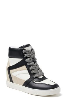 A hidden wedge brings street-chic attitude to a high-top sneaker that will instantly elevate your everyday wardrobe. 2" heel 6 1/2" shaft Lace-up style; side zip closure Synthetic and textile upper/synthetic lining and sole Imported Trendy Lace-up Wedge Boots For Streetwear, Trendy High-top Wedge Boots For Spring, Casual High-top Wedge Boots For Spring, Trendy High-top Wedge Sneakers With Height Increasing Feature, Trendy High-top Height Increasing Wedge Sneakers, Trendy Wedge Heel Platform Sneakers For Streetwear, High-top Synthetic Wedge Boots For Streetwear, Trendy Low-top Platform Wedge Boots, Trendy Lace-up Height Increasing Wedge Sneakers