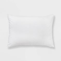 a white pillow on a white background