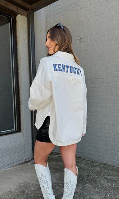 The pop of blue your game day look needed to cheer on our CATS! Wear this jacket oversized with a leather skort for a classic, but edgy look! This oversized jacket features a classic snap button front, collar, pocket and rounded hem to make a perfect breezy denim overshirt! Model is 5'6" with a 32DD bust, 27" waist, 36" hips, and wearing a large for a more oversized fit. Model usually wears size 2/4. Designed to fit oversized for an effortless and relaxed look. Stay true to size or size up for e Leather Skort, Denim Overshirt, Oversized Jacket, Stay True, Edgy Look, Snap Button, Game Day, Size 2, Collar