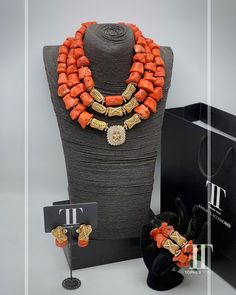 Description Our stunning Coral Bead Necklace and African pendant set are a perfect choice for anyone searching for a unique and eye-catching piece of jewellery. This ethnic necklace is ideal for fashion-forward individuals, who want to add a touch of elegance to their ensemble. Crafted from high-quality coral beads, this African beaded necklace features an intricate design that is a perfect reflection of the rich African cultures and traditions. With this fabulous necklace, you're sure to stand Elegant Red Coral Gemstone Beads, Elegant Coral Beads, Elegant Orange Red Coral Beads, Elegant Coral Gemstone Beaded Necklaces, Elegant Coral Beaded Necklaces With Gemstone, Traditional Coral Jewelry With Round Beads, Elegant Red Coral Beads For Jewelry Making, Elegant Coral Beaded Jewelry, Orange Red Coral Jewelry For Wedding