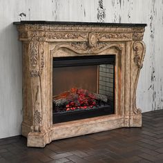 an ornate fireplace with red rocks in the middle and white paint on the wall behind it