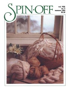 the cover of spin - off magazine shows a basket with yarn and flowers in it