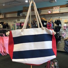 Navy/White/Red Beach Bag. Rope Handles. 14x10x5 Brand New With Tag Striped Travel Bags For Beach Season, Striped Bags For Beach Season Vacation, Beach Season Striped Beach Bags, White Beach Bag For Vacation Shopping, White Canvas Shopping Bag For Beach Season, Casual Striped Beach Bag For Beach Season, Navy Beach Bag For Daily Summer Use, White Nautical Bags For Summer, Navy Beach Bag For Daily Use In Summer