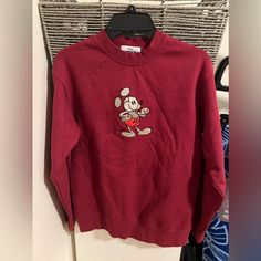 Never Worn! Bought Directly Off The Rack, So No Extra Tags Or Bags. This Is A Used Disney Parks Mickey Mouse Genuine Mousewear Pullover Sweatshirt In Size Small. The Sweatshirt Is Red And Features Mickey Mouse. It Is Suitable For Adults And Is Unisex. The Sweatshirt Is A Contemporary Disneyana Collectible And Falls Under The Category Of Apparel And Accessories, Specifically Coats, Jackets, And Outerwear. Fall Mickey Mouse Sweatshirt For Streetwear, Fall Mickey Mouse Crew Neck Sweatshirt, Fall Streetwear Mickey Mouse Tops, Casual Mickey Mouse Crew Neck Sweatshirt, Casual Mickey Mouse Sweatshirt For Streetwear, Casual Crew Neck Mickey Mouse Sweatshirt, Red Cartoon Print Sweatshirt For Fall, Mickey Mouse Long Sleeve Sweatshirt For Fall, Casual Mickey Mouse Sweatshirt For Winter