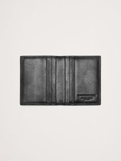 We cut this sleek card case from beautiful, sturdy pebbled leather with just enough room to hold the essentials.  Five card slots.  Height: 6" (Unfolded) Width: 4" Card Case, Pebbled Leather, Card Slots, Slots, Banana Republic, Sleek, Leather, Black