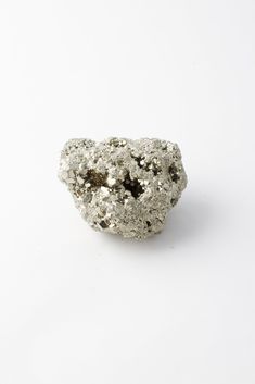 Pyrite is an iron sulfide mineral with a hardness of 6-6.5. It’s crystal patterns are cubic, pyritohedral, or octahedral. The name pyrite is derived from the Greek word for fire. Pyrite’s shiny metallic appearance has earned it the nickname “fool’s gold.” The ancient Incas used Pyrite as mirrors. It is found all over the world, but important deposits are in Italy, Spain, and Peru. Pyrite is said to enhance willpower, helping one to overcome bad habits. This beautiful specimen from Peru has a bri Fool’s Gold, Crystal Pattern, Silver Eagles, Greek Words, Minerals And Gemstones, Bad Habits, Stones And Crystals, Heart Ring, Spirituality