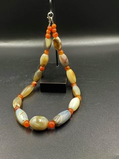 The Rare and Unique Mala Necklace of Indo Tibetan Sulumnai Agate Beads The age of this beads are more than 1000 years old it was used as Amulet Beads and used as prayers Beads in prayer malas Fast and free shipping service Enjoy Traditional Oval Agate Beads, Gems, And Cabochons, Traditional Oval Agate Beads Gems And Cabochons, Hand-strung Oval Agate Beads, Amber Agate Hand-strung Beads, Oval Agate Beads For Gemstone Cabochons, Oval Agate Beaded Necklaces, Amber Agate Beads With Natural Stones, Amber Polished Agate Beads, Amber Agate Beads