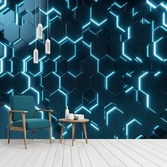 a chair and table in front of a wall with blue hexagonals on it