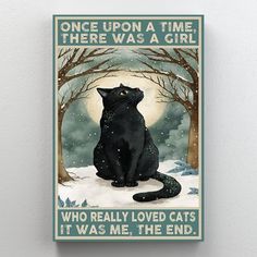 a black cat sitting in the snow with trees on it's side and an inscription that