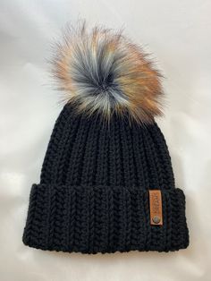 "This beanie is so warm and cozy! The adjustable brim allows for the hat to be worn fitted, or slightly slouchy. A modern, handmade rendition of the classic beanie Made with 100% acrylic, vegan friendly yarn.   This hat is designed to fit the average adult's 20\"-23\" head, although it is very stretchy and allows for a wide range of fits Hand wash recommended.  DO NOT put hats with pom poms in the dryer, they will burn.   *I try my best to capture the colors accurately in my photos, but please note that colors may vary slightly due to lighting and screen settings*" Trendy Adjustable Beanie For Cold Weather, Trendy Adjustable Beanie For Fall, One Size Hats For Cold Weather In Fall, Warm Bonnet For Fall, One Size Fits Most, Warm Adjustable Beanie One Size, Adjustable Beanie For Cold Weather In Fall, Trendy Adjustable Crochet Hat For Winter, Soft Knit Hat One Size For Fall, Trendy Warm Hats For Cold Weather