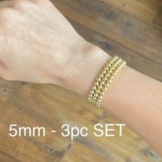 "3 pc sets at a great value - These make great gifts, holiday, birthday, friendship, or just because! Additional Details Below 👇🏻 OR Enter shop here to see more options (we have gold filled bracelets too) https://www.etsy.com/shop/AshleyNicoleByJulie BRACELET SIZE: To find your bracelet size - Measure all the way around your wrist bone ensuring contact with skin (snug, no gaps, but not tight) - ORDER 1/2 inch larger for fitted bracelets or 1\" larger for a looser bracelets. NOTE: PLEASE MEASUR Gold Wrap Bracelet With Spacer Beads As Gift, Gold Hand-strung Wrap Bracelet Gift, Gold Wrap Bracelet With Spacer Beads, Gold Hand-strung Crystal Bangle Bracelet, Dainty Gold Crystal Bracelet With Round Beads, Gold Crystal Bangle Bracelet With Spacer Beads, Gold Crystal Bracelet With Spacer Beads, Gold Crystal Bracelet With 8mm Beads, Gold Crystal Bracelet With 8mm Round Beads