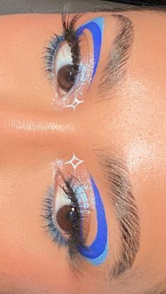 Space Eyeliner Looks, Blue Lightning Eye Makeup, Blue Beetle Makeup, Graphic Eyeliner Makeup Looks, Blue Liner Looks, Blue And White Graphic Liner, Purple And Blue Eyeliner, Blue Graphic Eye Makeup, Cool Makeup Looks Creative Eyeliner