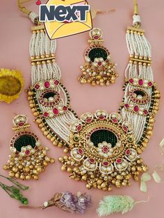 This Gorgeous Sabyasachi inspired Gold  Necklace with matching earrings. Comprises of Fine Oversized Uncut Kundan polki stones with navratan stone This choker is flexible and takes the shape of the neck. Fine quality and craftsmanship. Perfect for desi weddings. Necklace comes in drawstring cord therefore adjustable Earrings length: Approx 2.5 inches Kundan Chandbali Bridal Sets For Celebration, Kundan Bridal Sets With Chandbali Shape For Celebration, Chandbali Kundan Bridal Sets For Celebration, Chandbali Bridal Necklace For Celebrations, Cutdana Jewelry Sets For Celebrations, Traditional Chandbali Jewelry With Stone Work, Festive Temple Jewelry Bridal Sets With Latkans, Tilla Chandbali Bridal Sets For Celebration, Festive Bridal Sets With Latkans In Temple Jewelry Style